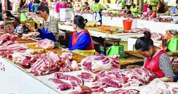 Pork, persuasion and propaganda Chinese market stall