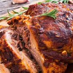 Fresh pork sales rose over Easter Big Piece of Slow Cooked Oven-Barbecued Pulled Pork shoulder