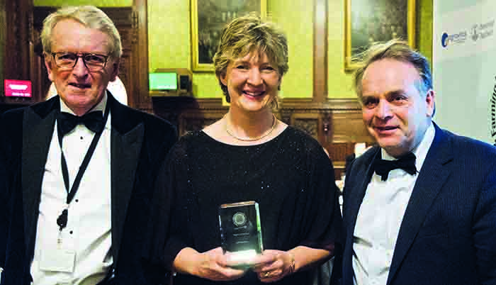 Morrisons picked up Retailer of the Year at the Farm Business Food and Farming Industry awards. Sophie Throup collected the honour from awards host Christopher Meyer (left) and EFRA committee chair Neil Parish