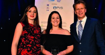 Louise Blenkhorn receiving award from Laura Hancox, Zoetis national veterinary manager, with host Andrew Castle