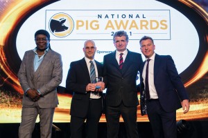 left) and Rob McGregor received their award from ForFarmers’ UK pig director Craig Saunders (right) with host Stephen K Amos