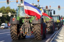 Farmer,Tractors,With,Dutch,Flag,On,Highway,To,The,Hague,